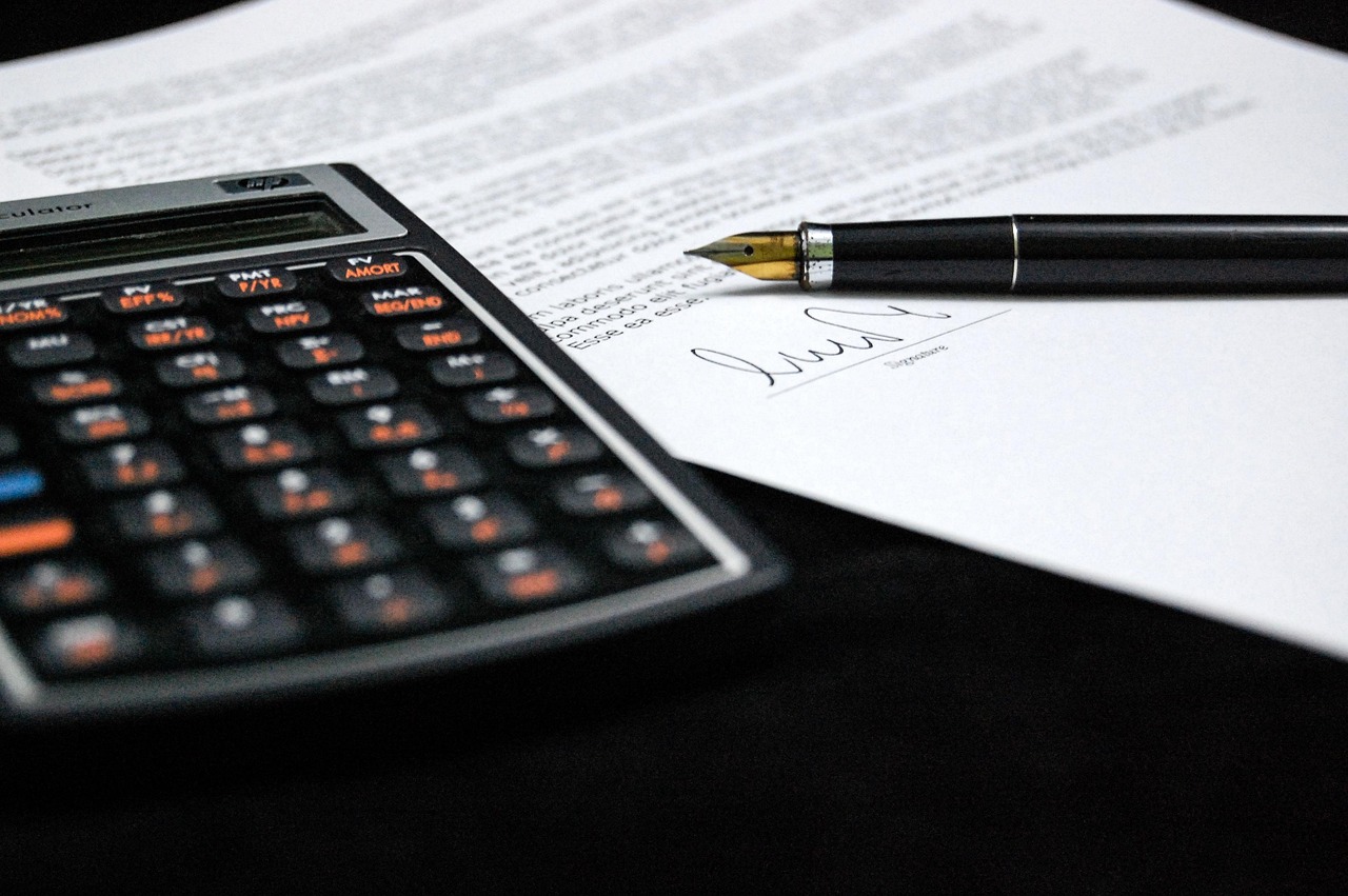 Accounting tools and documents representing the bankruptcy means test calculation.